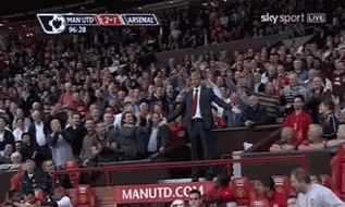 Arsene Wenger in the stands at Old Trafford